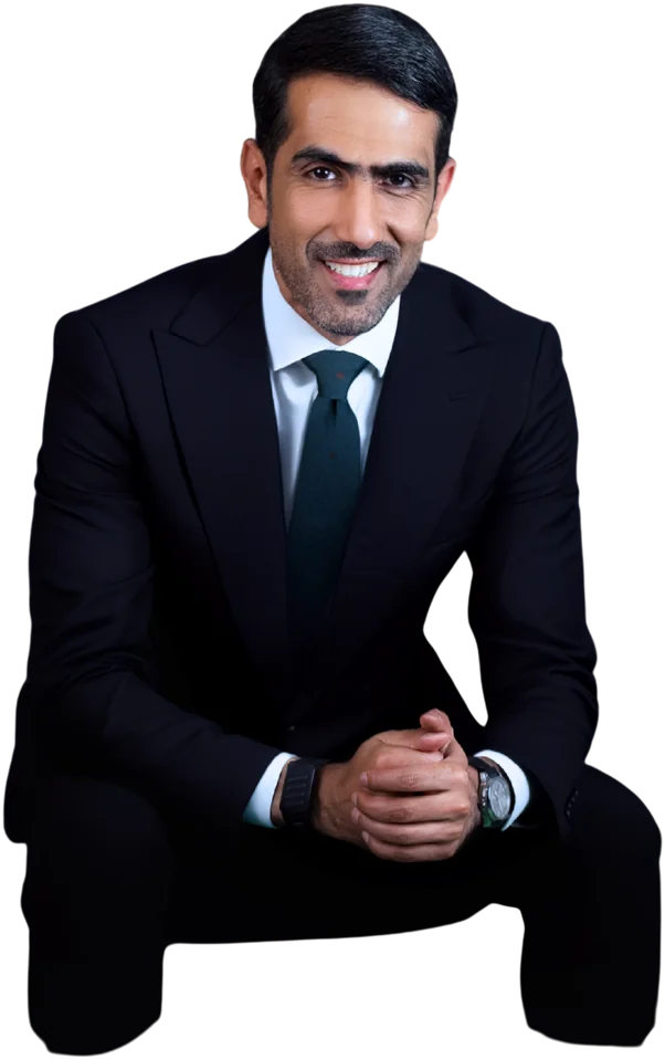 Mohammed Saadon Al Kuwari in a suit as beIN Sports presenter